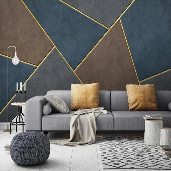 Geometric wallpaper accent wall in a living room
