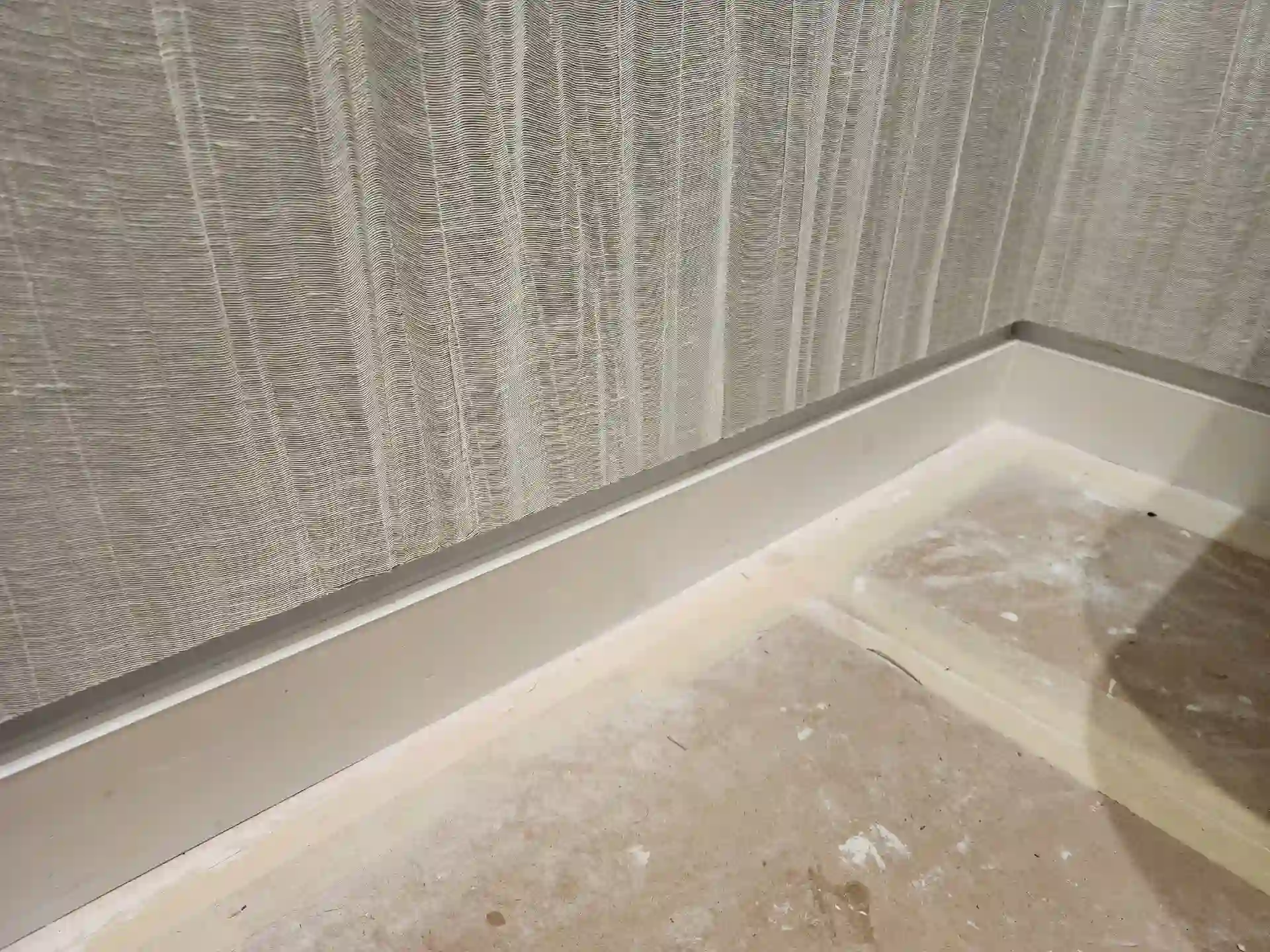Close view of a softly textured wallcovering surface